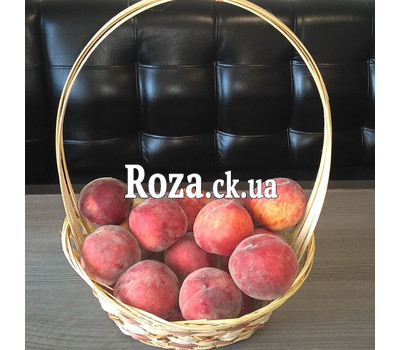 Delicious peaches in a basket 1
