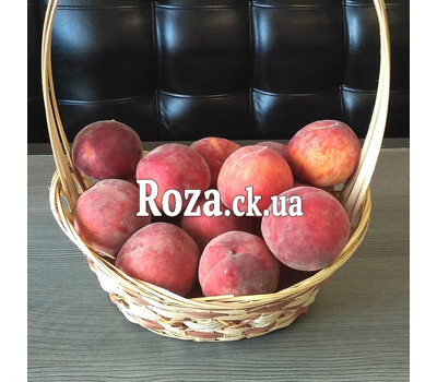 Delicious peaches in a basket 2