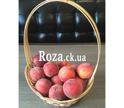 Delicious peaches in a basket 4