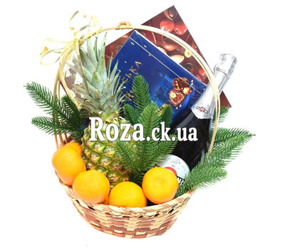 Basket for New Year with champagne and sweets