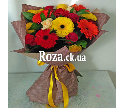 Bright bouquet of roses and gerberas 1
